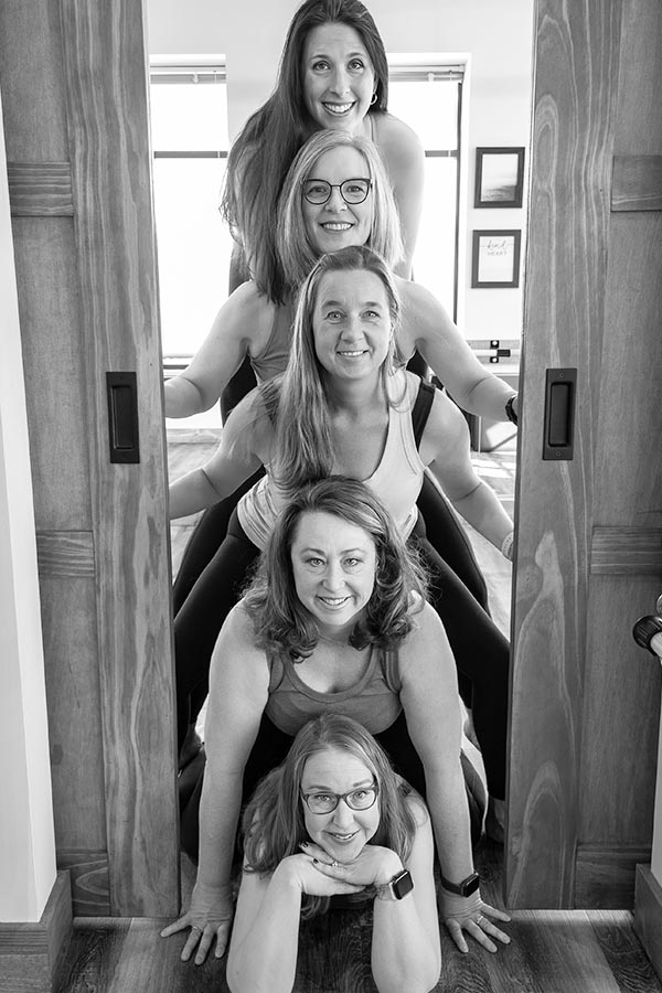 Jlb Pilates Instructors Stacked In Doorway 900